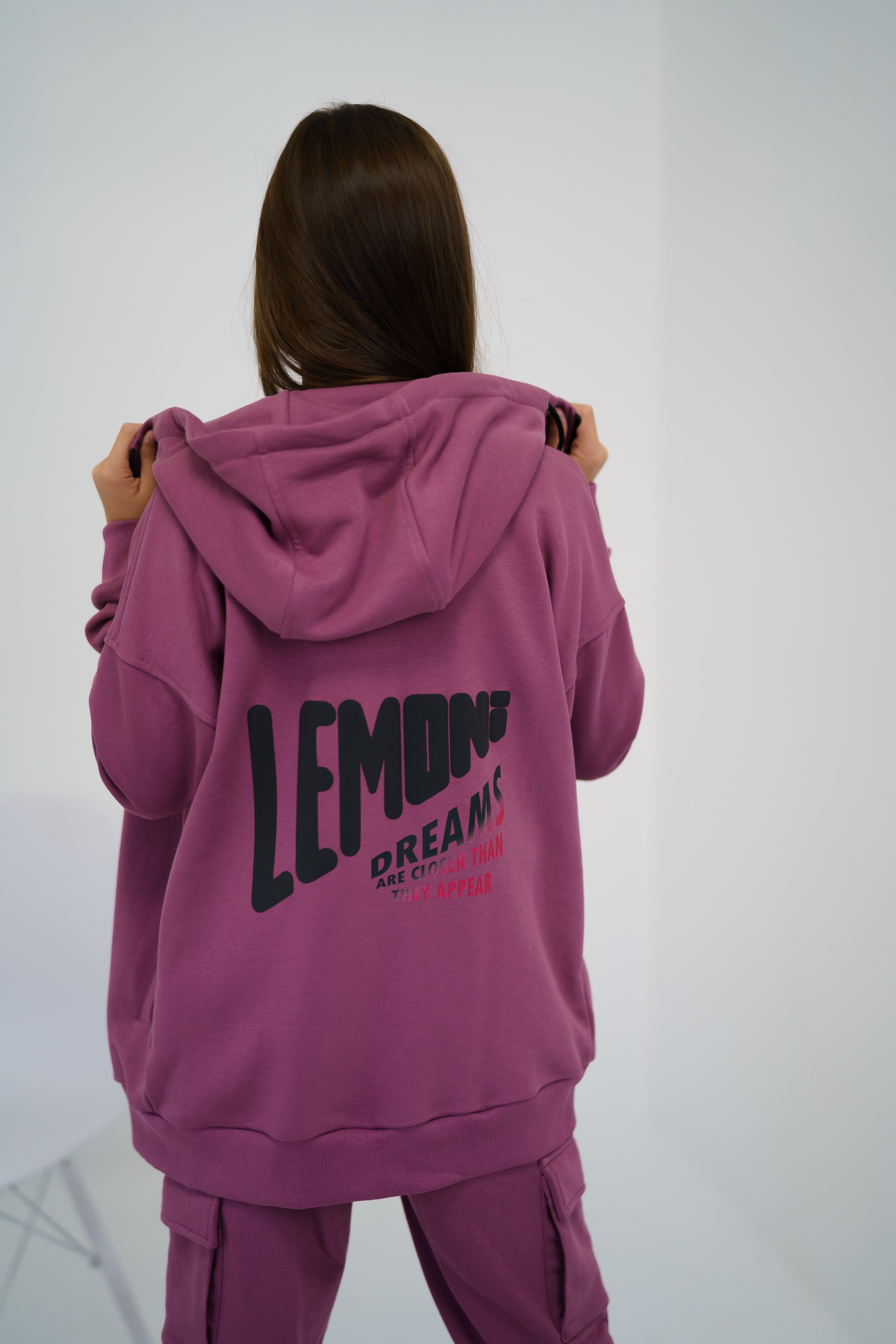 hooded jacket of the pink tracksuit by Lemoni - backside view