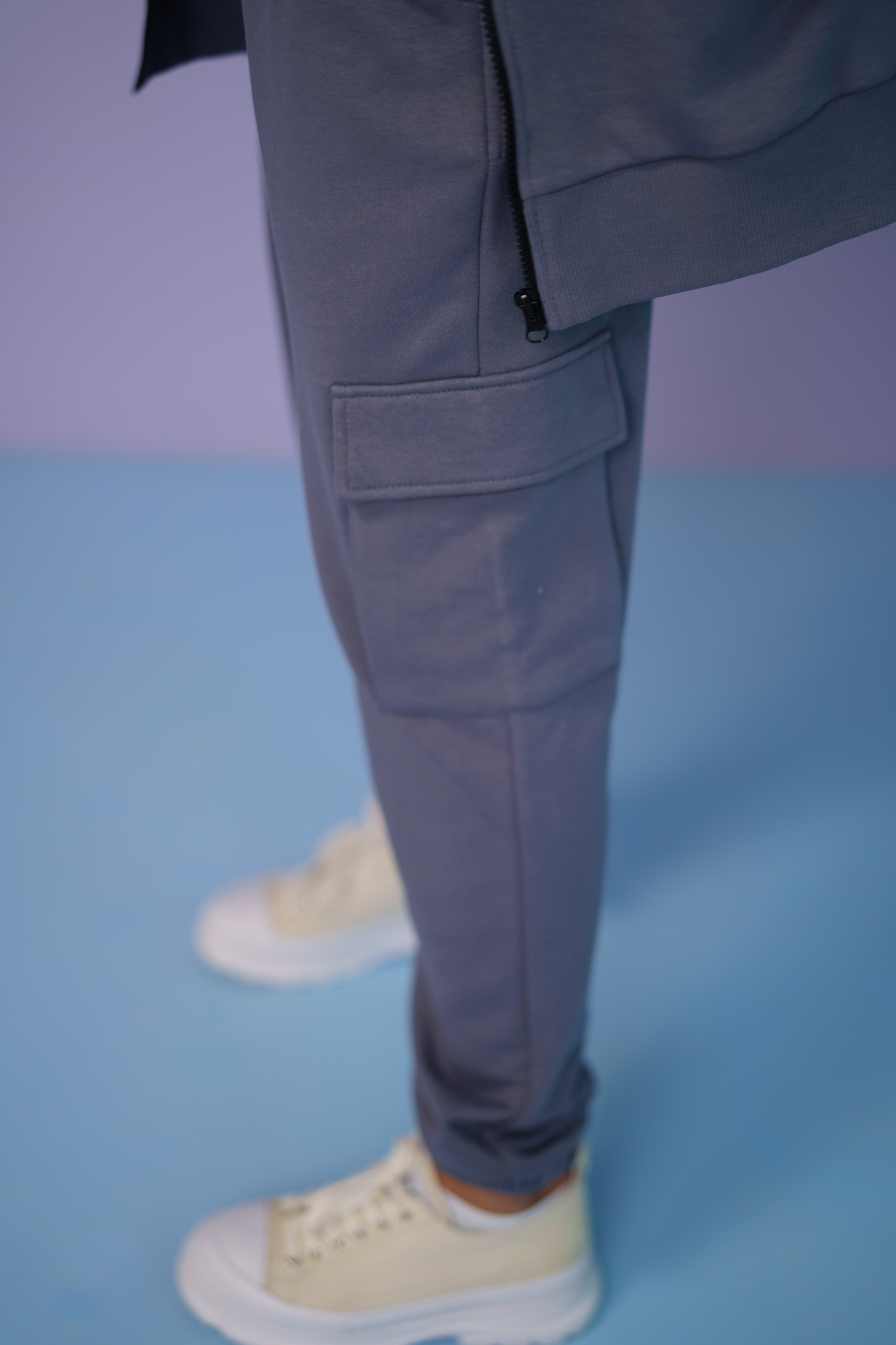 joggers of the gray tracksuit side view