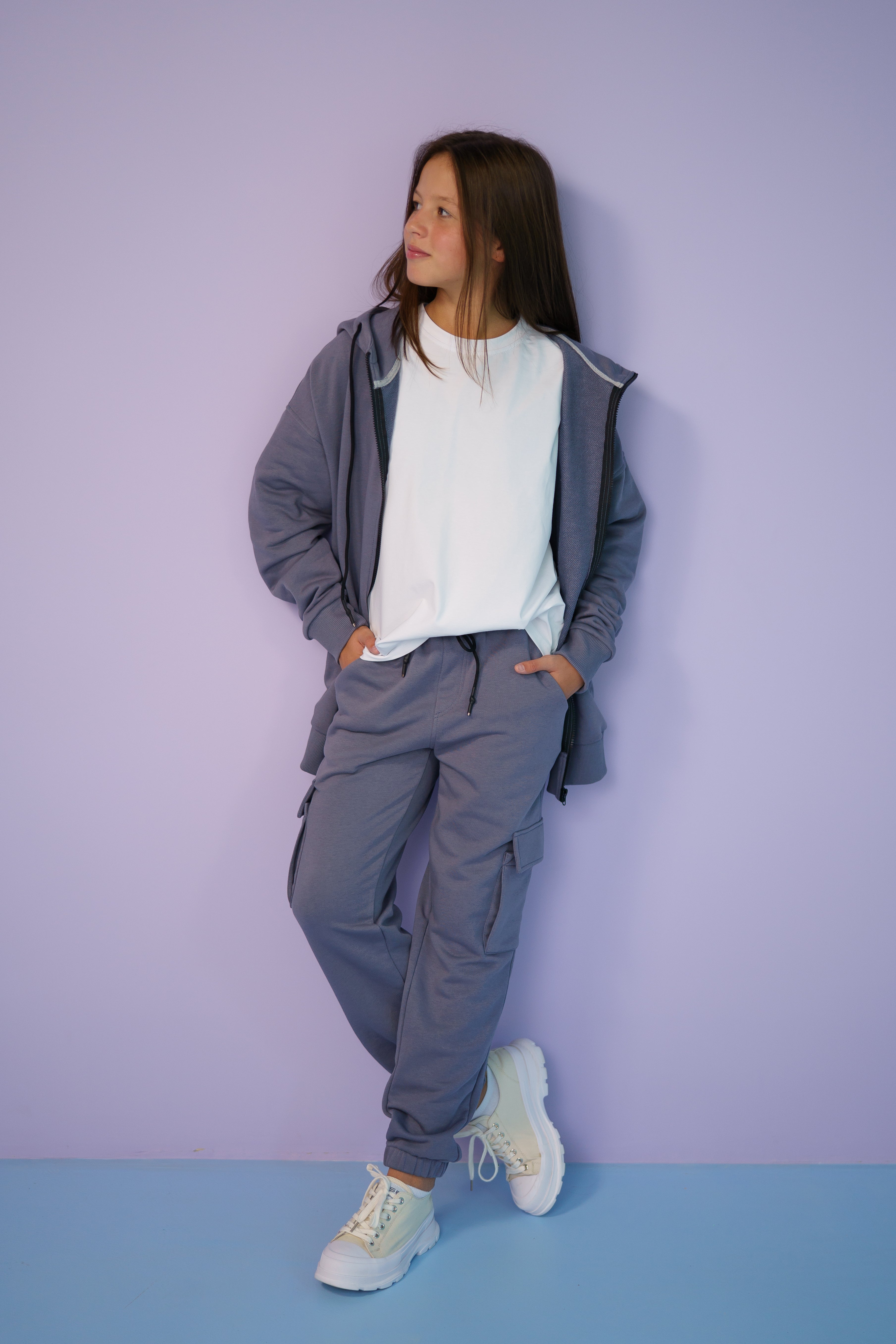 girl wearing tracksuit gray and white t-shirt